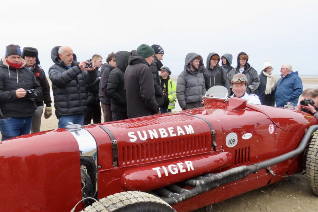 Crowds celebrated the return of the Sunbeam Tiger to Ainsdale Beach in Southport 100 years after it was driven by Sir Henry Segrave as he broke the world land speed record on 16th March 1926. The car was driven by Wing Commander Andy Green OBE. Photo by Andrew Brown Stand Up For Southport